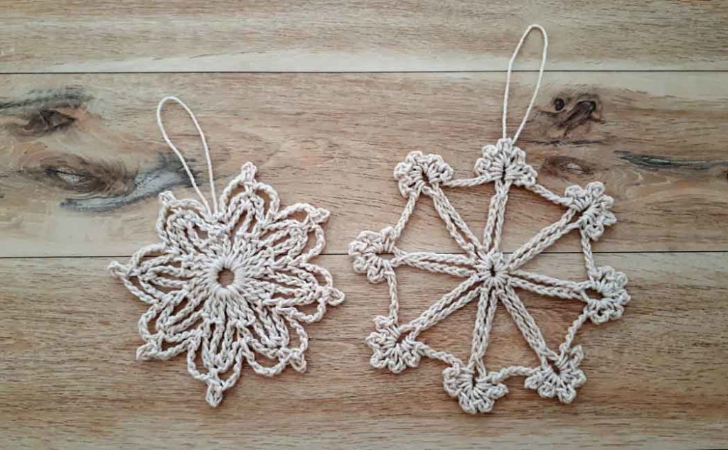 two crocheted snowflake patterns