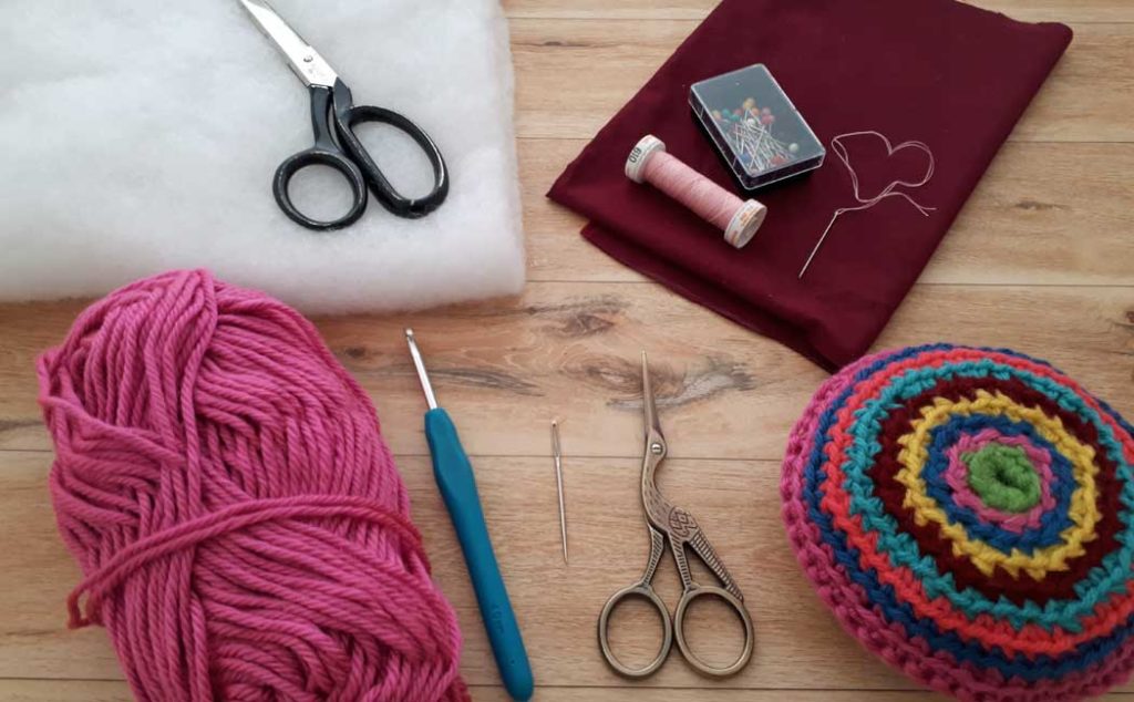 round crocheted pincushion tutorial supplies
