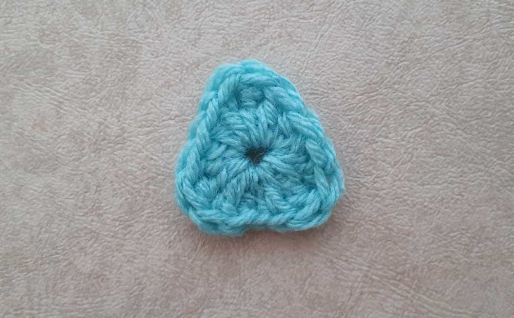free-form crochet triangle shape